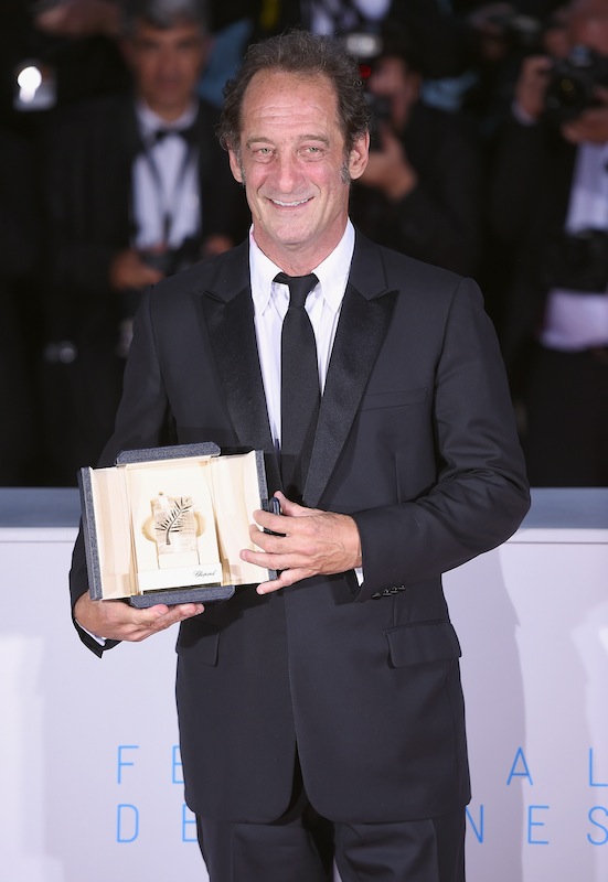 CANNES, FRANCE - MAY 24:  Actor Vincent Lindon, winner of the Best Actor Prize for his role in the film ' La Loi du Marche' (The Measure of a Man) poses at the photocall for the winners of the Palm D'Or during the 68th annual Cannes Film Festival on May 24, 2015 in Cannes, France.  (Photo by Venturelli/WireImage)